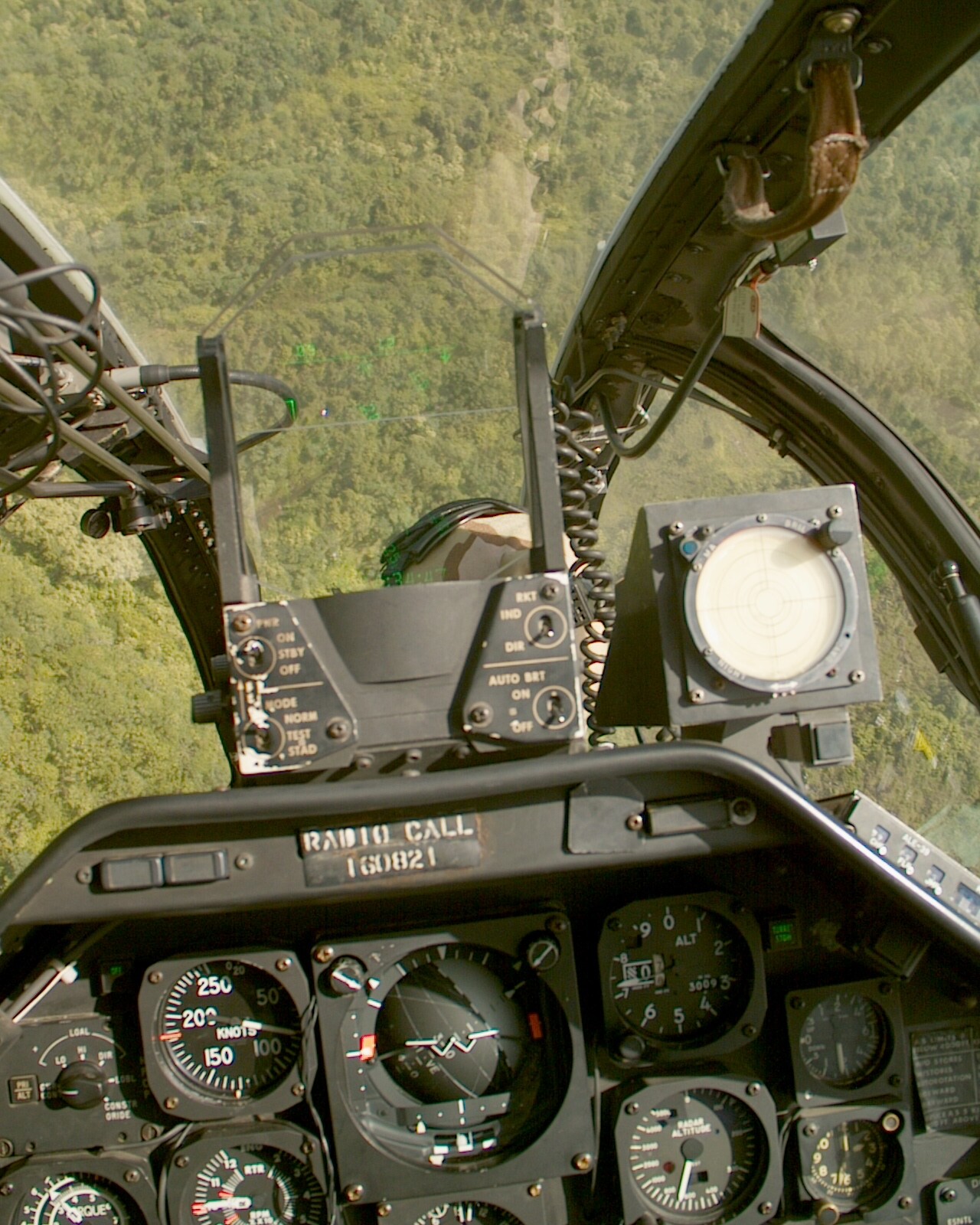 The view from the back seat of a Cobra. The difference between this one (flying in Hawaii) and ours in Iraq was the windscreen. In Iraq it would be covered with bug guts, soot, and sand. Gash could barely see anything from the back seat of our aircraft in Iraq.